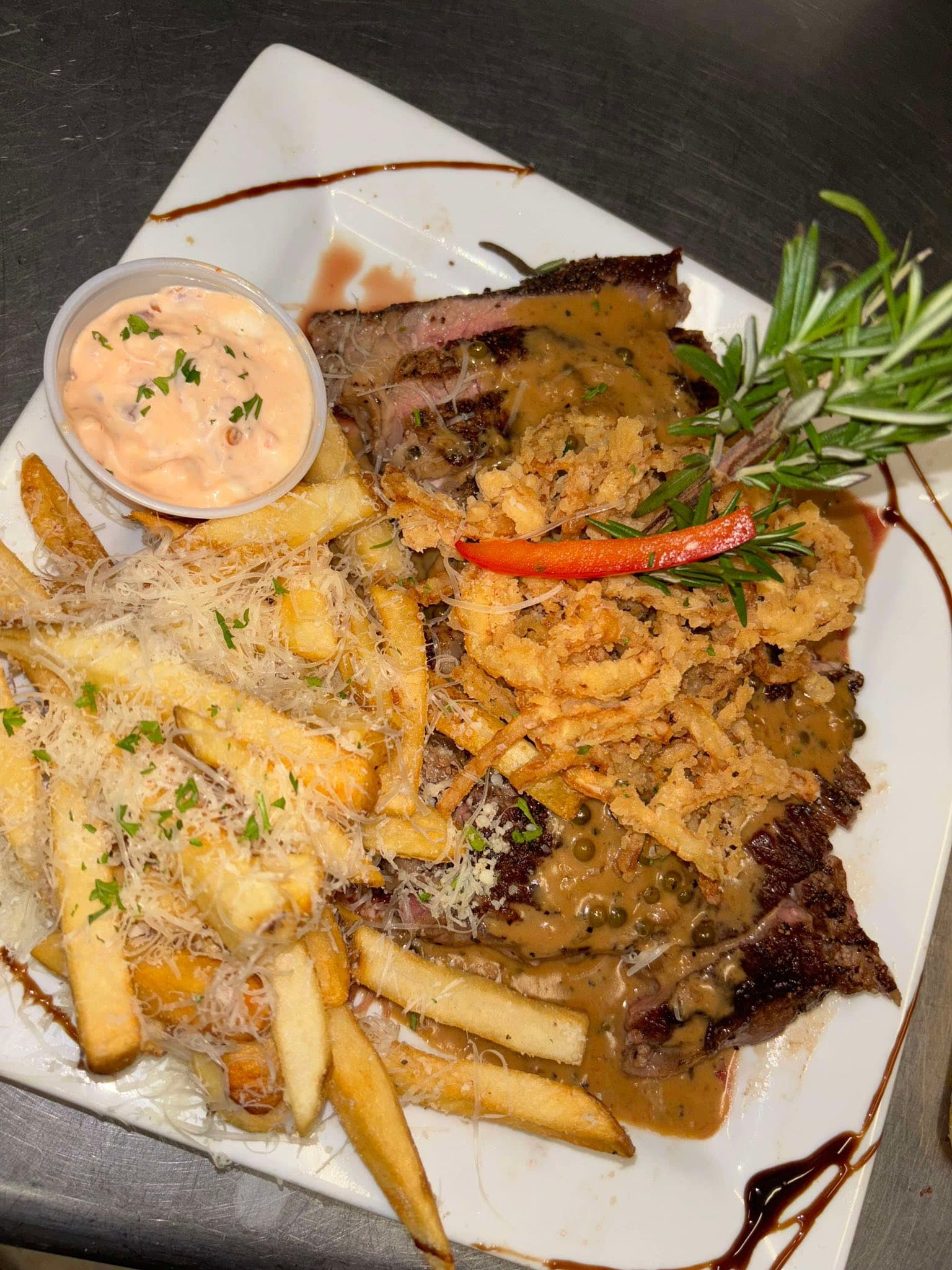 Premium Black Angus steak with crispy frites